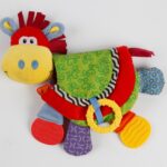 Colorful Baby Activity Book Toy with Crinkle Paper, Squeaker, Teething Rings & Textured Fabrics – Soft Plush Horse Design for Sensory Play and Early Learning